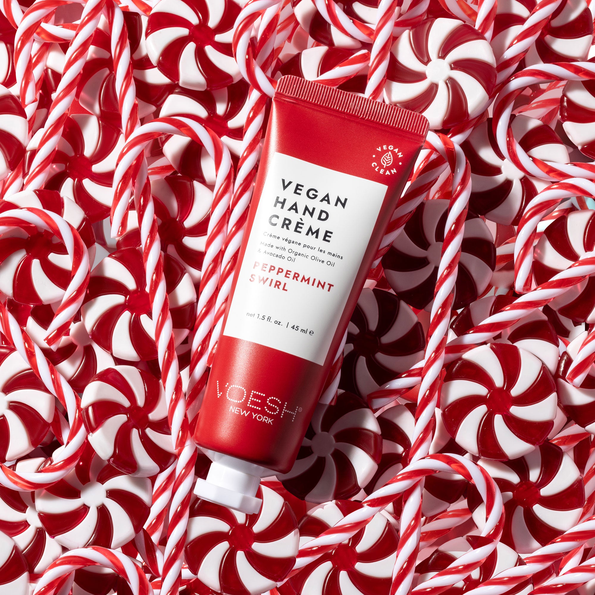 Peppermint Swirl lotion on top of peppermint candies